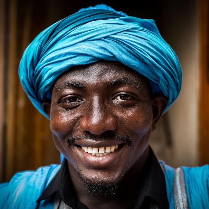 A former hospitality manager turned floral design lead examining corporate arrangements